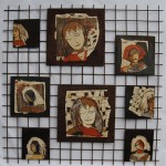 Portraits sur tôle rouillée - collage de papier et tissu, dentelle, fil de couture